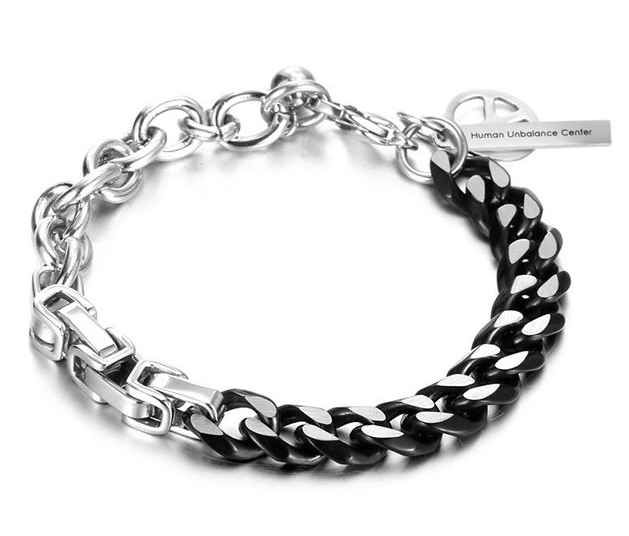Two-tone black and silver mixed-chain bracelet with toggle clasp, peace-sign charm and engraved tag.