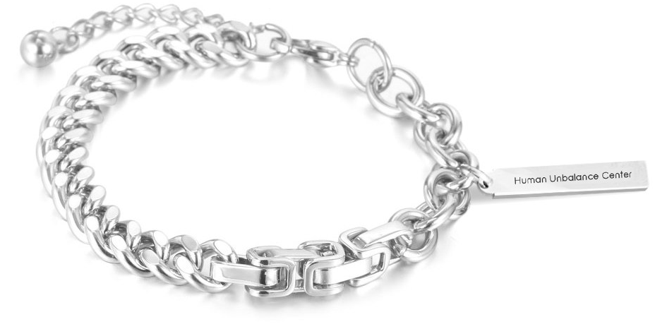 Silver-tone mixed-link bracelet combining curb, byzantine, and cable chains with an engraved bar tag on a white background.