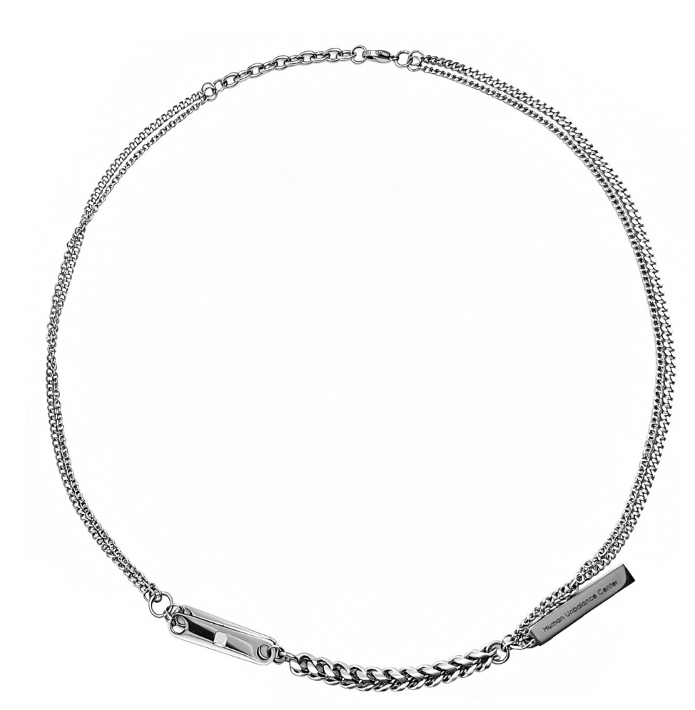 Silver-tone necklace mixing a doubled fine chain with a heavy curb-chain section, an engraved bar, and a rectangular slide-lock clasp.