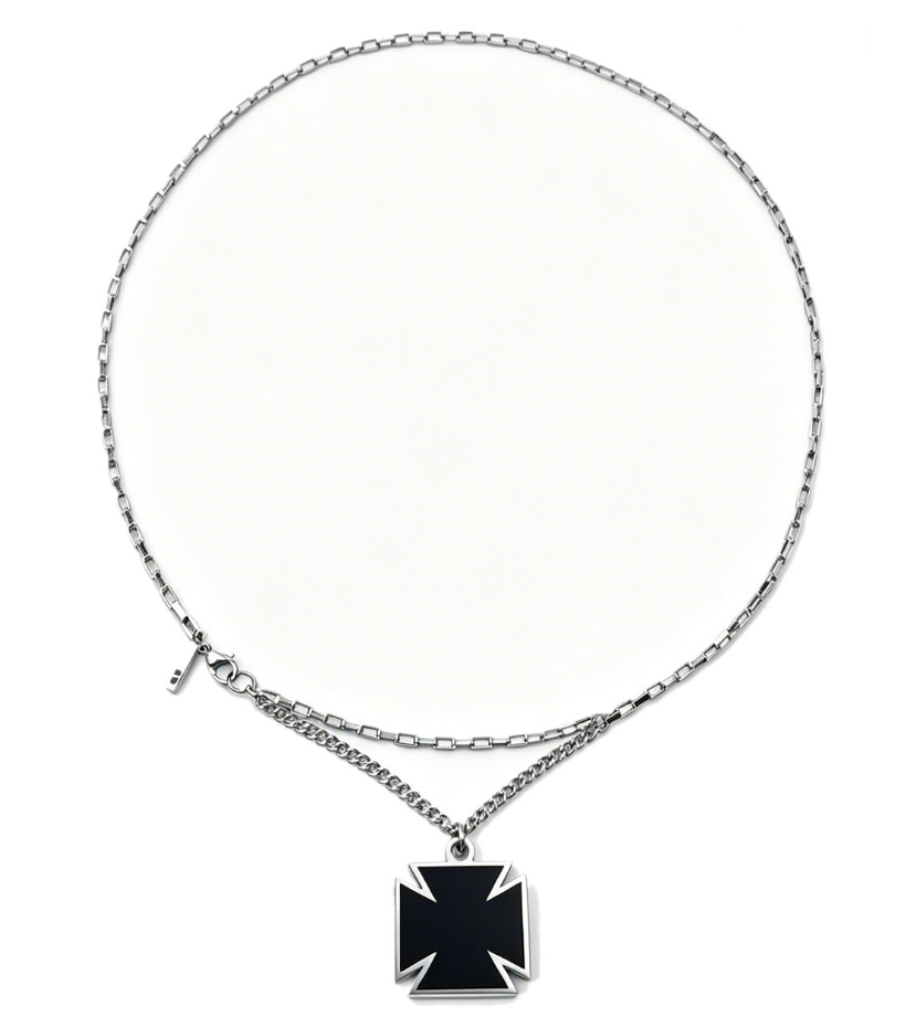 Black flared cross pendant on a silver-tone mixed-link chain necklace.