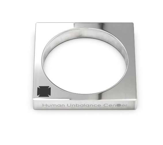 Silver-tone square-plate ring with a circular finger opening and engraved emblem