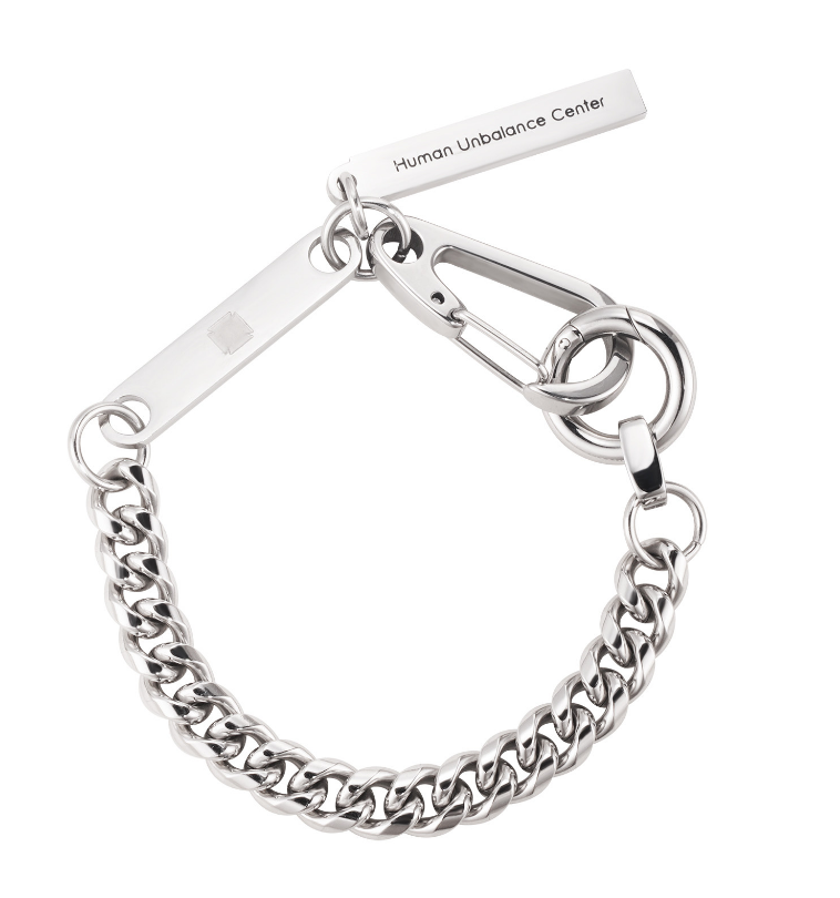 Silver-tone curb-chain bracelet with engraved ID bar tag and carabiner hook clasp on a white background