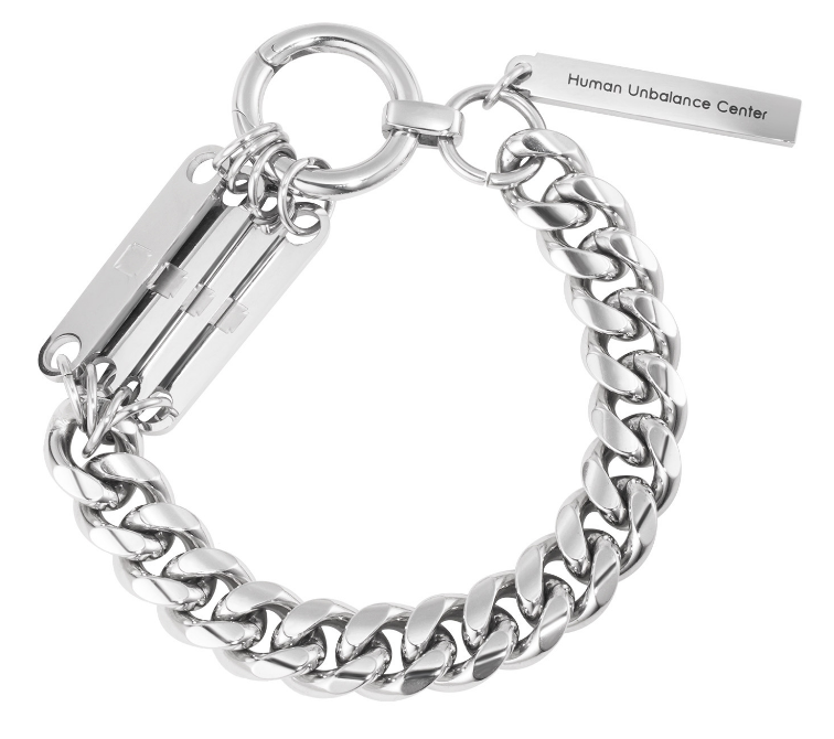 Chunky silver-tone curb-chain bracelet with an oversized ring clasp and suspended engraved bar and blade charms.