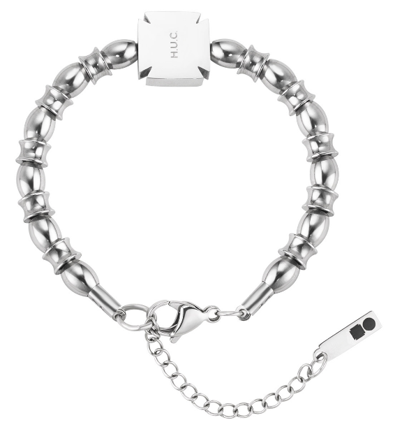 Silver-tone beaded bracelet with polished barrel beads, ridged spacers, and an engraved square plate charm