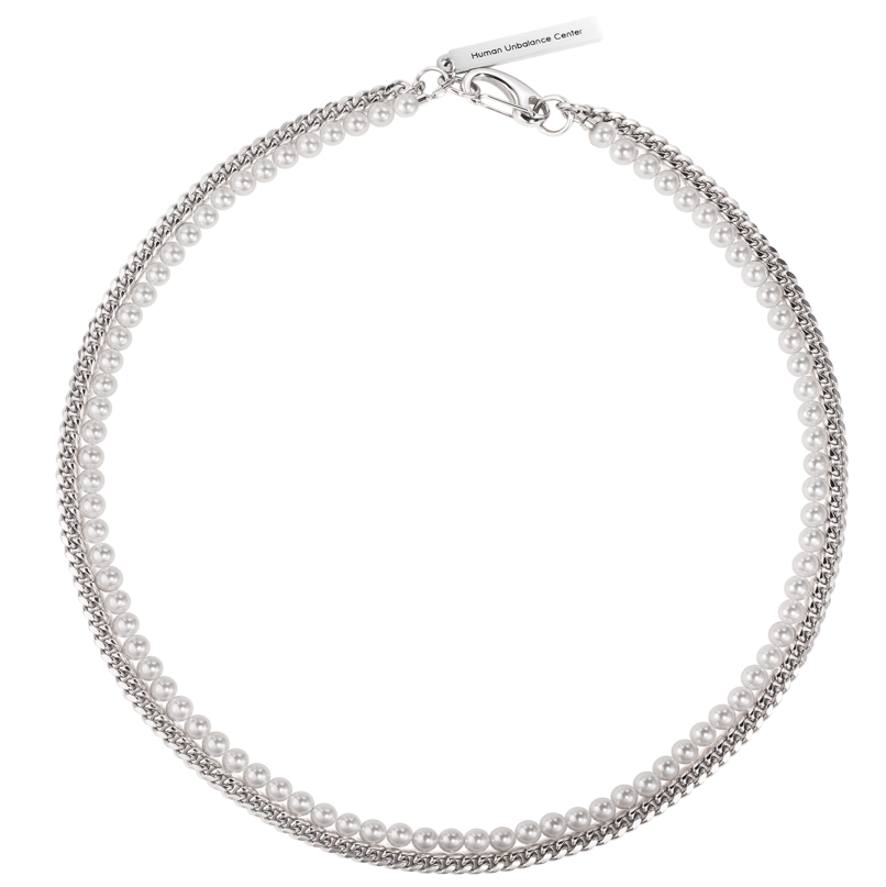 Double-strand necklace combining a white simulated-pearl row and a silver-tone curb chain with lobster clasp.