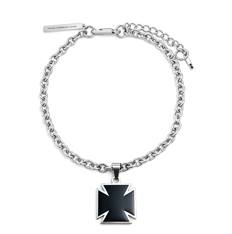 Silver-tone rolo chain necklace with a black enamel flared cross pendant