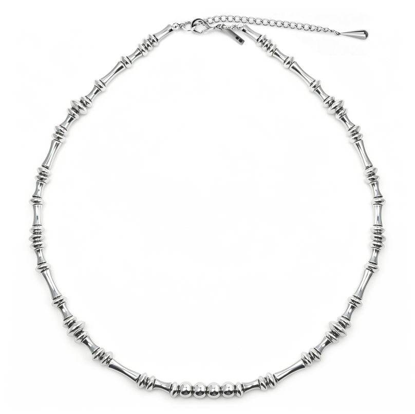 Silver-tone necklace of tapered bar links with a central cluster of polished beads.